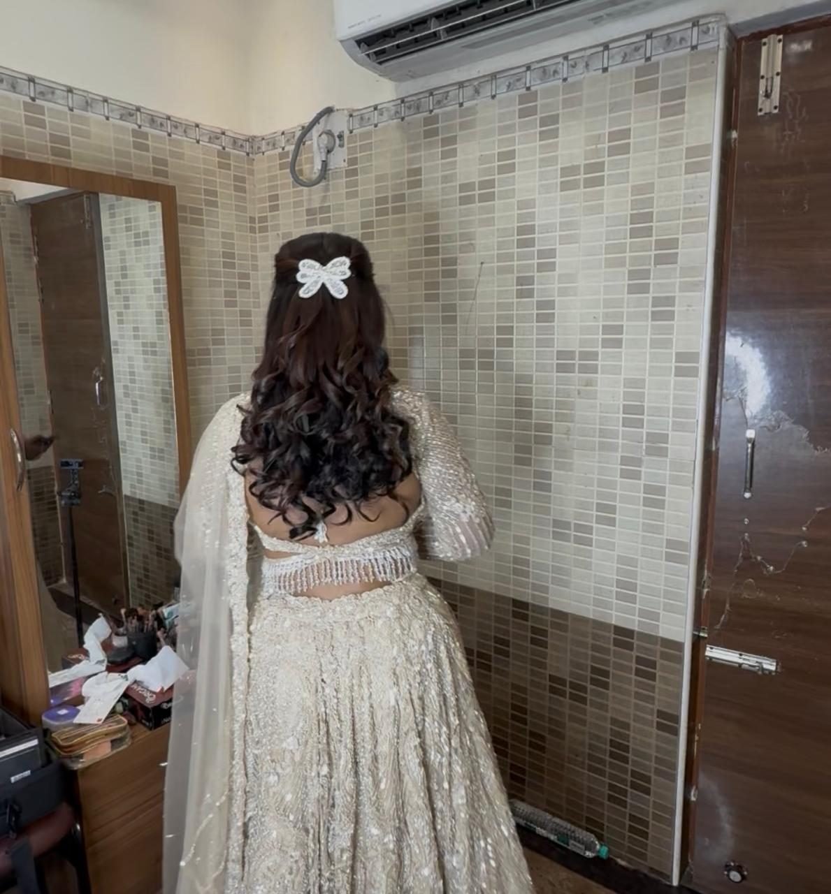 Wedding hairstyle and hair styling by Anu Rotrico, Chennai