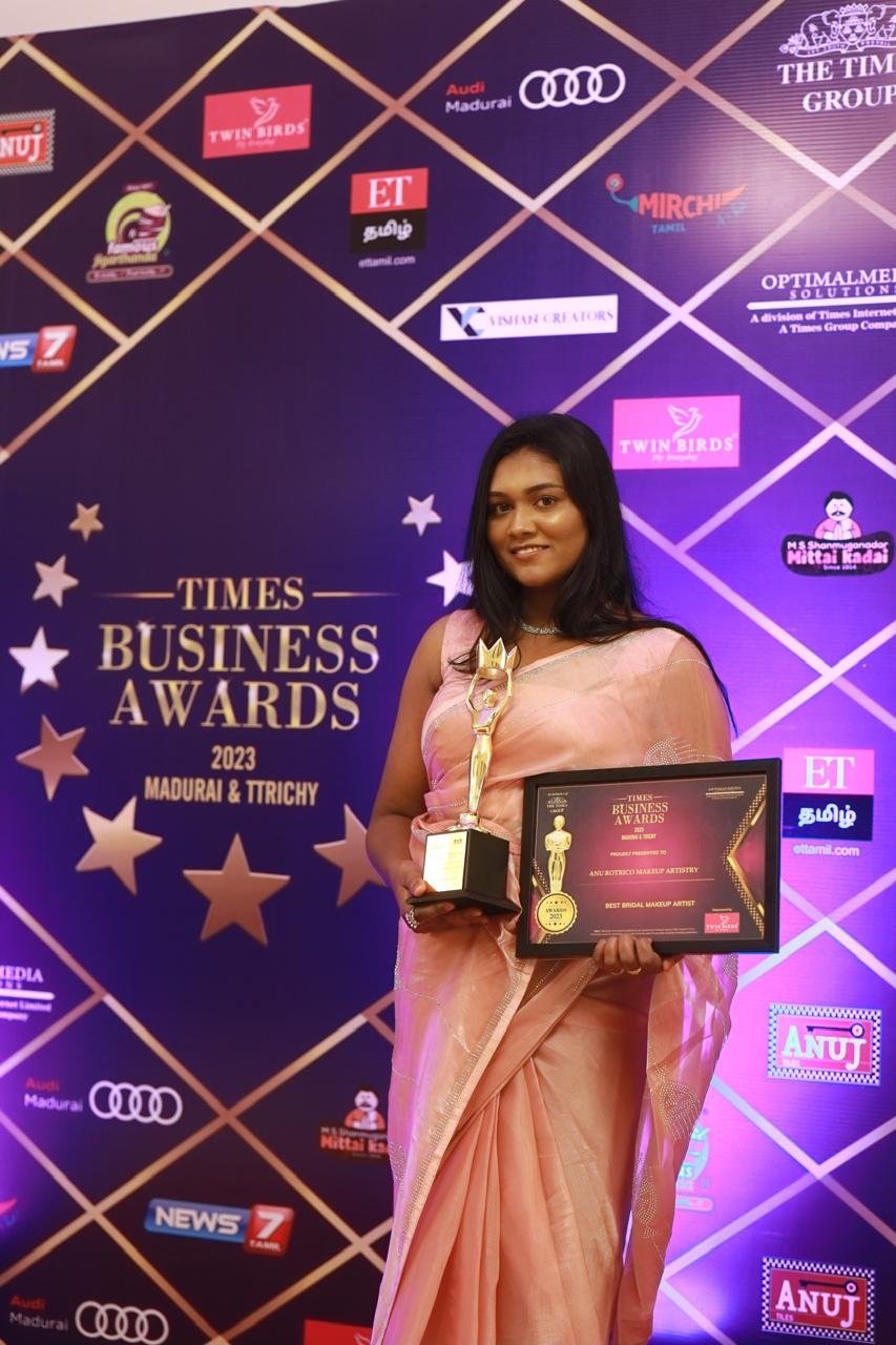Anu Rotrico receiving the Times Business Awards 2023 Best Bridal Makeup Artist award