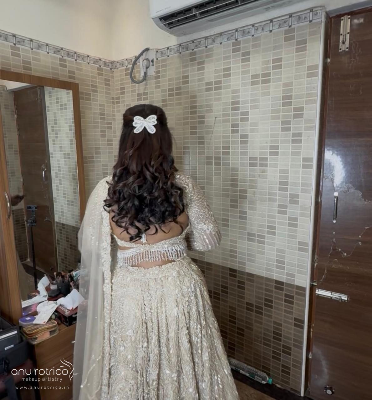 Wedding hairstyle and hair styling by Anu Rotrico, Chennai