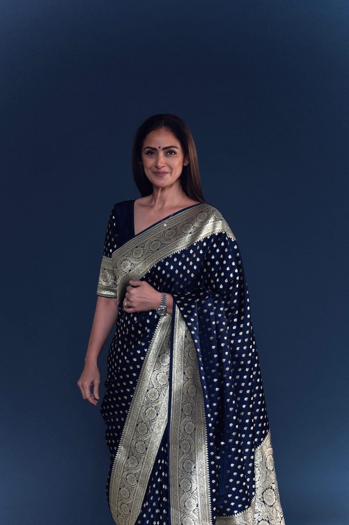 Actress Simran in a navy and gold Banarasi silk saree, makeup by Anu Rotrico for the Ananda Vikatan Cinema Awards